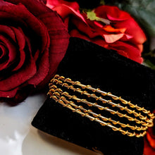 Five Gold Cuff Bracelets